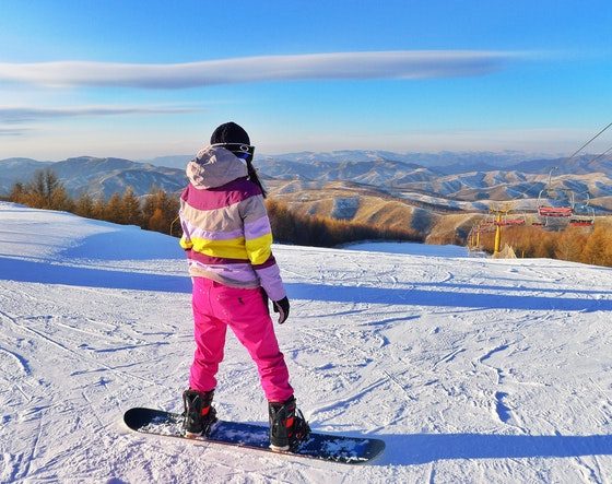 person snowboarding on field 1705667